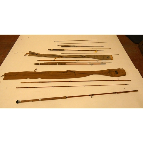 66 - Four assorted vintage split cane fishing rods.