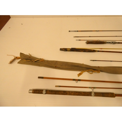 66 - Four assorted vintage split cane fishing rods.