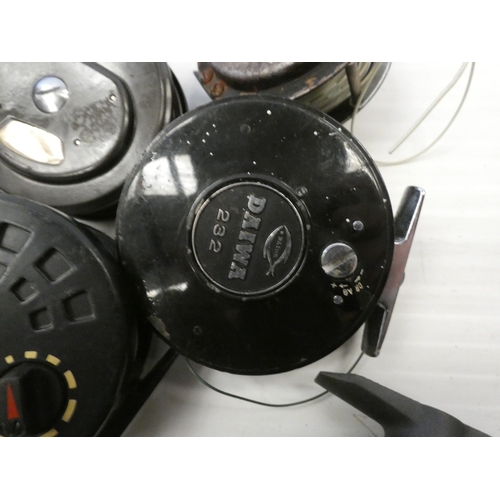 74 - Group of five fishing reels comprising of four fly reels, and an Alvey 500B sea reel. (5)