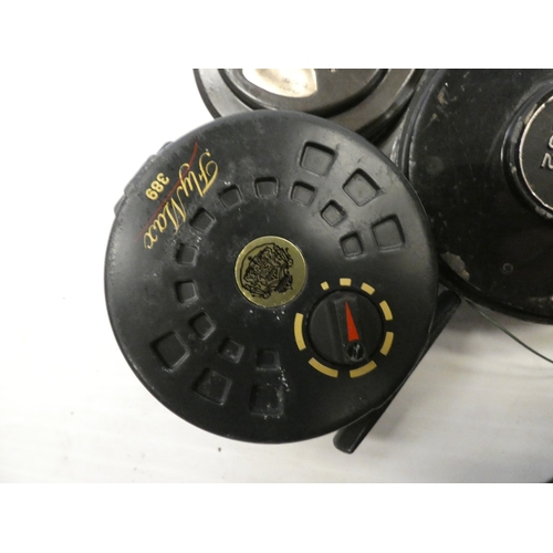74 - Group of five fishing reels comprising of four fly reels, and an Alvey 500B sea reel. (5)