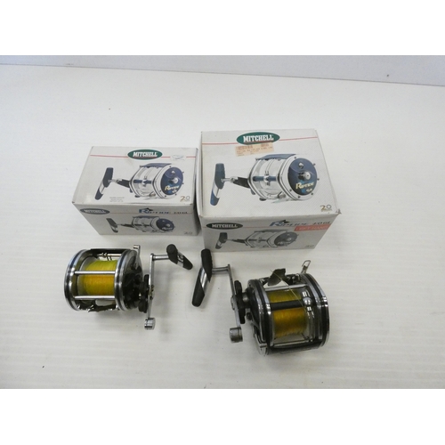 76 - Two boxed Mitchell Riptide sea fishing casting reels comprising of a 2/0 GL and a 4/0 GL.
