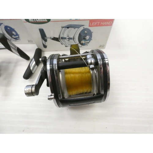 76 - Two boxed Mitchell Riptide sea fishing casting reels comprising of a 2/0 GL and a 4/0 GL.