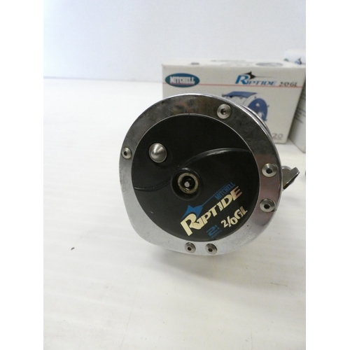 76 - Two boxed Mitchell Riptide sea fishing casting reels comprising of a 2/0 GL and a 4/0 GL.