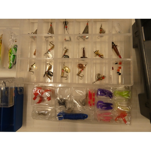81 - Fishing bag containing assorted boxes of trout lures etc.
