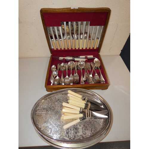 98 - Cased stainless and silver plated part canteen of cutlery, loose table knives and two oval gallery t... 