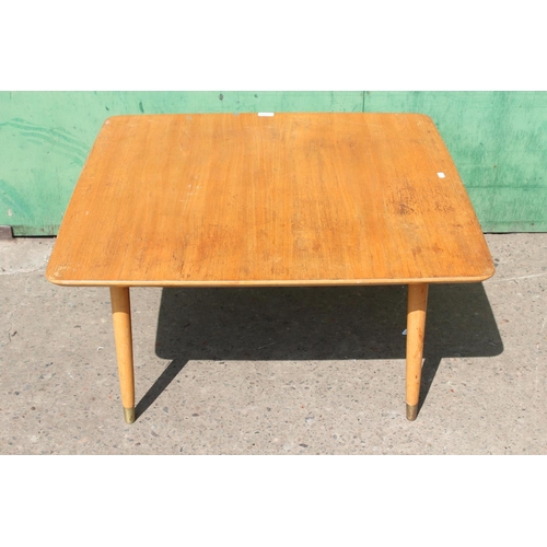 492 - Mid-century blonde oak occasional table,  the rounded square top, raised on tapering turned legs, 82... 