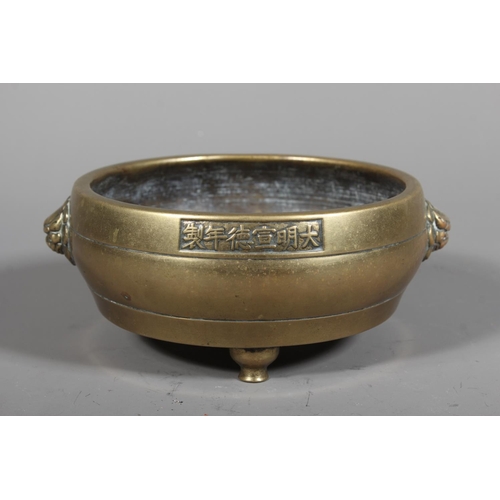 438 - Chinese bronze censer of shallow bowl form with fu dog handles, six character mark to the side and d... 