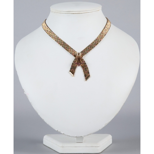 154 - 9ct gold link necklace with garnet set pendant, gross weight, 54.2g.