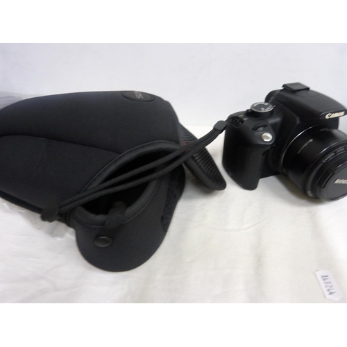41 - Canon 350D camera, charger and soft cases.