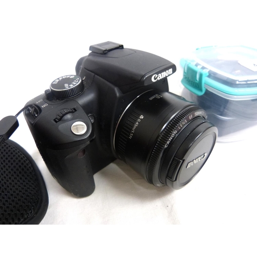 41 - Canon 350D camera, charger and soft cases.