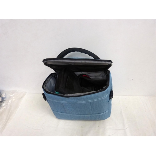 41 - Canon 350D camera, charger and soft cases.