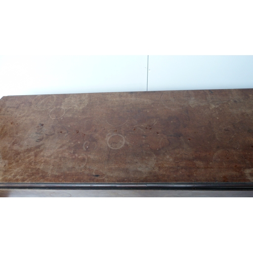 497 - George III mahogany drop flap wake or dining table on turned supports and pad feet, 189cm wide.