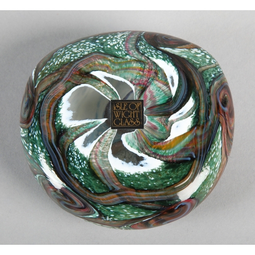 Isle of Wight paperweight decorated with swirling iridescent patterns.