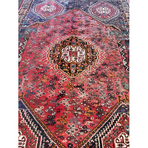391 - Persian Qashqai hand knotted rug, featuring a central medallion within smaller Nomadic tribal design... 
