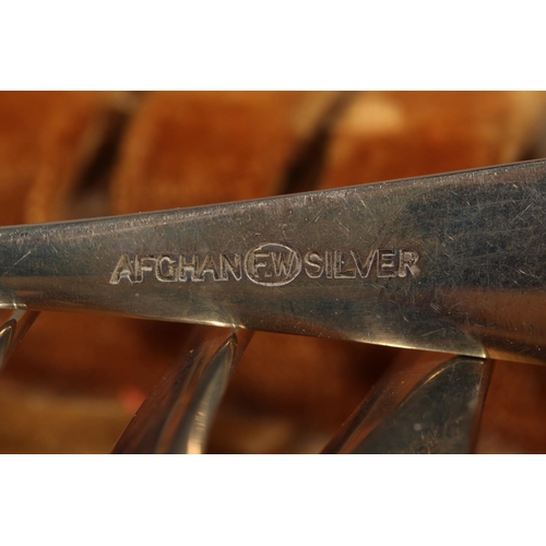 13 - Cased set of silver plated spoons and tongs.