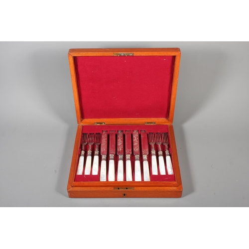 18 - Cased set of&nbsp; fish knives and forks with mother of pearl handles.