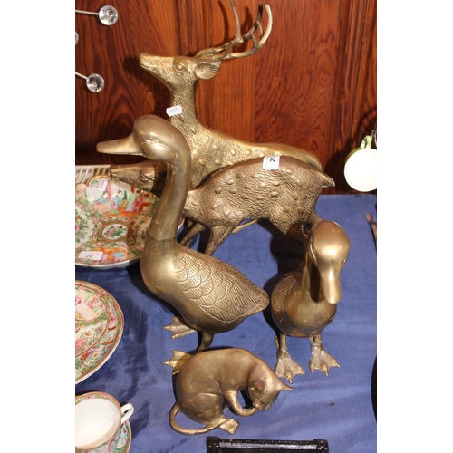 21 - Brass animal models to include reindeer and faun, ducks, cat, etc.