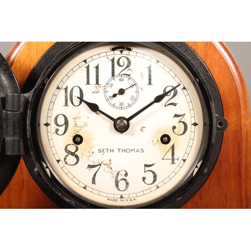 31 - Seth Thomas USA clock on mahgany stand.