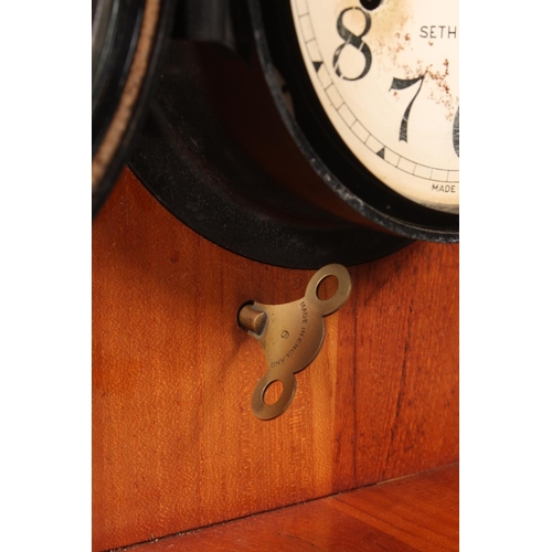 31 - Seth Thomas USA clock on mahgany stand.