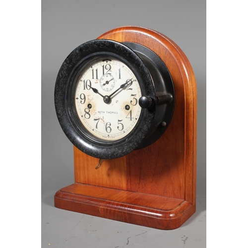 31 - Seth Thomas USA clock on mahgany stand.
