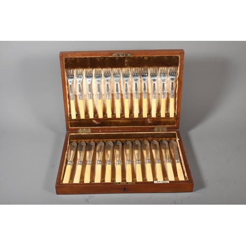 33 - Walker and Hall cased fish knives and forks.