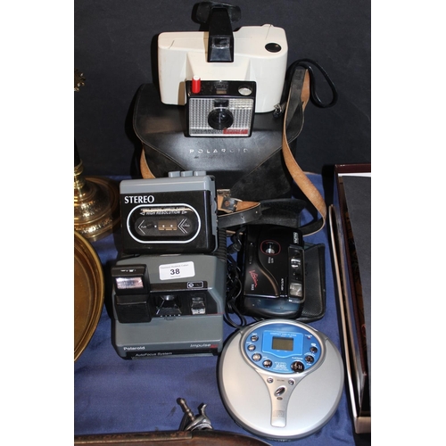 38 - Polaroid Land camera in case, Polaroid Impulse AF, Compact CD player, etc.