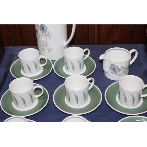 4 - Susie Cooper part coffee sets to include Glen Mist pattern cups, saucers, coffee pot, etc.