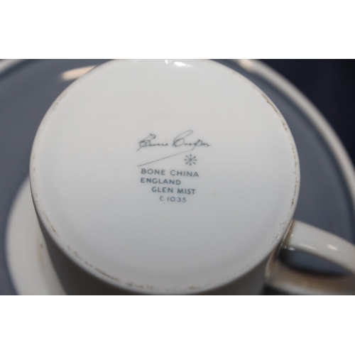 4 - Susie Cooper part coffee sets to include Glen Mist pattern cups, saucers, coffee pot, etc.