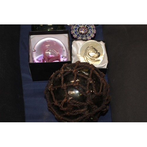 53 - Glassware to include paperweights, cranberry glass centre piece, etc.