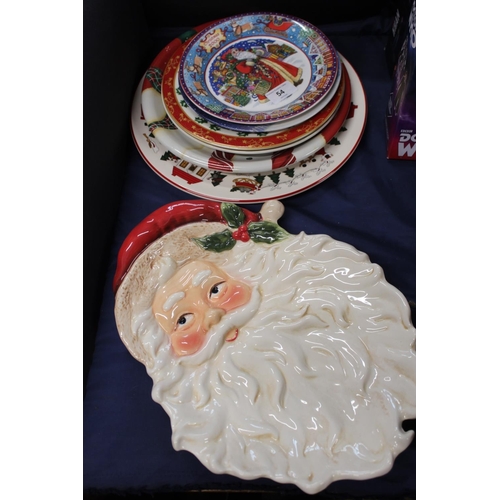 54 - Decorative Christmas ceramics to include a Fitz & Floyd Santa Claus serving dish, a Masons Chris... 