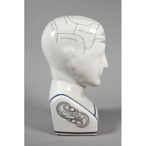 11 - L.N Fowler ceramic Phrenology head with detailed map of the human brain with crackle glaze surface.