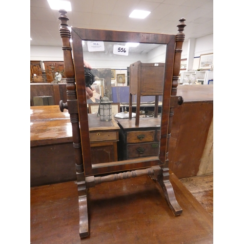 556 - Mahogany dressing glass.