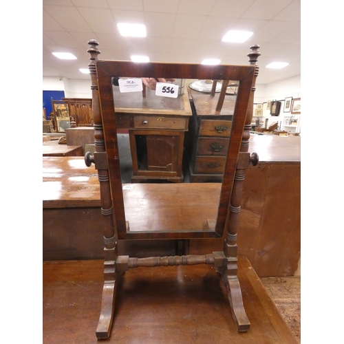 556 - Mahogany dressing glass.