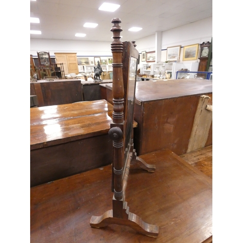 556 - Mahogany dressing glass.