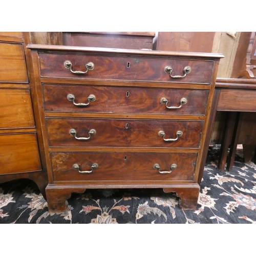 557 - Georgian mahogany chest of four draws on bracket feet.