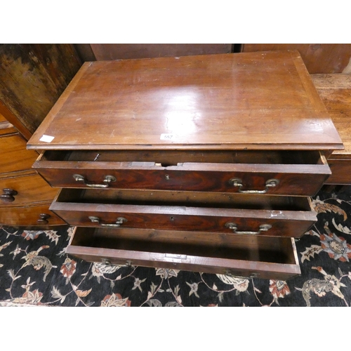 557 - Georgian mahogany chest of four draws on bracket feet.