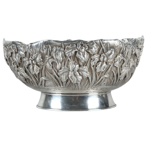 180 - Kuhn & Komor Japanese silver oval bowl with ornate decoration of irises..21cm dia. marked to bas... 