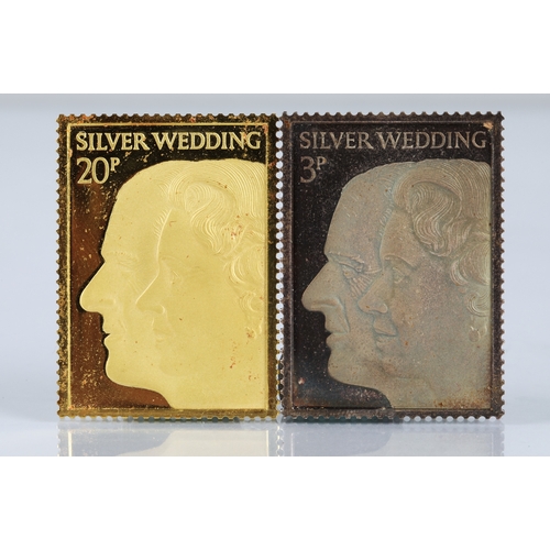 128 - The Royal silver wedding commemorative stamp replicas, 22ct gold replica stamp (26.5g) and silver re... 
