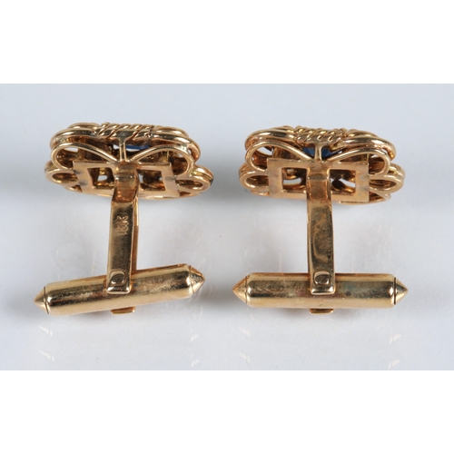 64 - Pair of gents 18ct gold cuff links set with sapphires, gross weight 11.2g