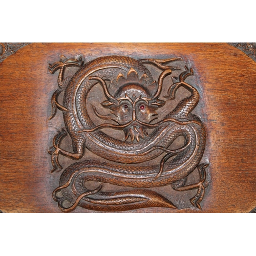 1 - Oriental carved mahogany box, the lid with carving of a dragon, 30cm long.&nbsp;