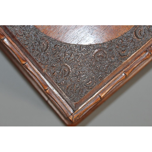 1 - Oriental carved mahogany box, the lid with carving of a dragon, 30cm long.&nbsp;
