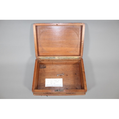 1 - Oriental carved mahogany box, the lid with carving of a dragon, 30cm long.&nbsp;