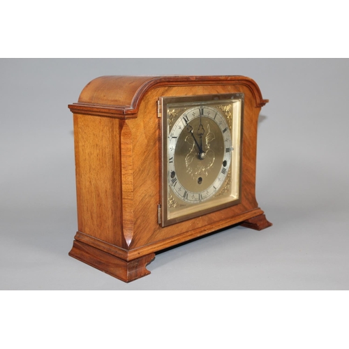11 - Jamieson and Carry Elliot clock, chiming on seven gongs, held in walnut veneered case, 29cm long.&nb... 