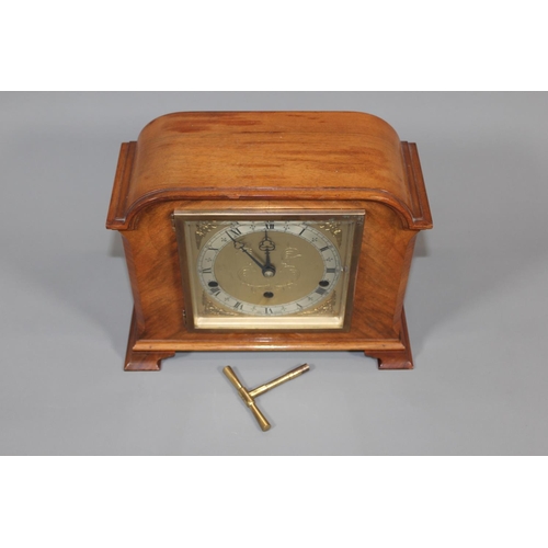 11 - Jamieson and Carry Elliot clock, chiming on seven gongs, held in walnut veneered case, 29cm long.&nb... 