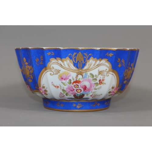 31 - Antique Serves style blue, white and gilt bowl with hand painted floral vignettes, 23cm diameter.&nb... 
