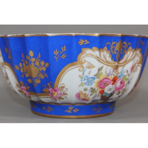 31 - Antique Serves style blue, white and gilt bowl with hand painted floral vignettes, 23cm diameter.&nb... 