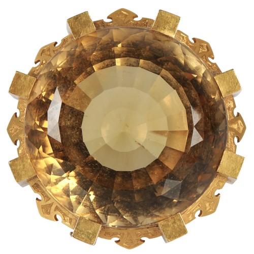Large circular citrine mounted in yellow metal, gross weight 33g. 4cm diameter