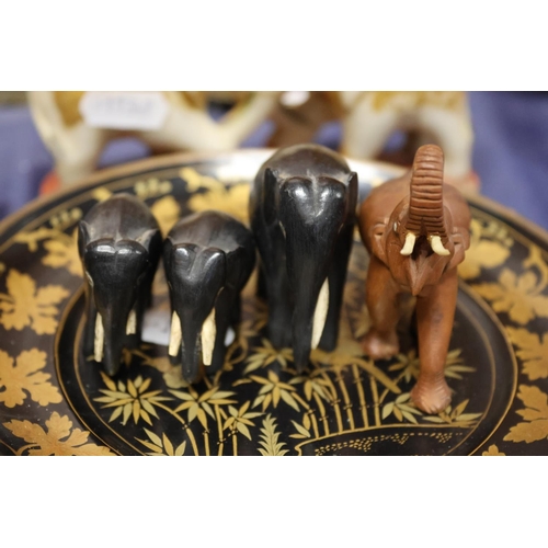12 - Lacquered dishes, boxed soapstone elephants and other carved elephants.
