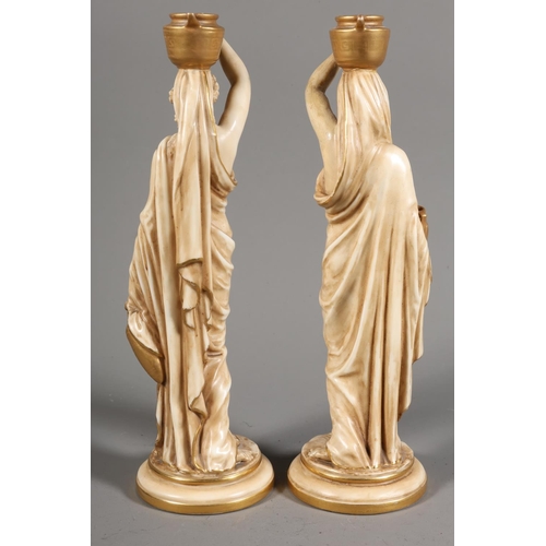 15 - Pair of Royal Worcester figurines modelled as Grecian water carriers, 25cm high.