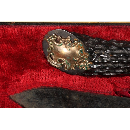 16 - Cased carving set comprising of faux horn-handled knife, fork and sharpener, Francis Howard, Aberdee... 